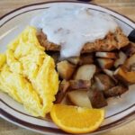 Chicken Fried Steak Served with two eggs, hash browns, & toast